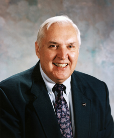 A portrait of former NASA Public Affairs Officer Hugh Harris.