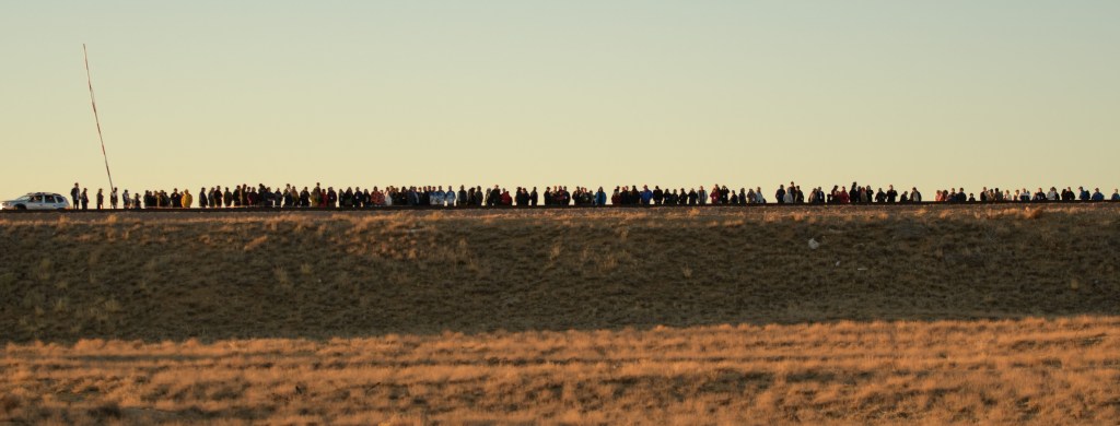 Invited guests, tourists and officials watch as the Soyuz rocket is rolled out by train to the launch pad, Tuesday, Oct. 9, 2018 at the Baikonur Cosmodrome in Kazakhstan. Expedition 57 crewmembers Nick Hague of NASA and Alexey Ovchinin of Roscosmos are scheduled to launch on October 11 and will spend the next six months living and working aboard the International Space Station.