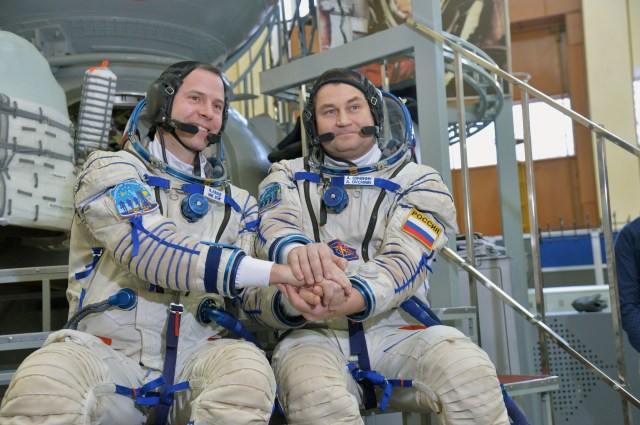 At the Gagarin Cosmonaut Training Center in Star City, Russia, Expedition 55 backup crewmembers Nick Hague of NASA (left) and Alexey Ovchinin of Roscosmos (right) pose for pictures during a day of qualification exams Feb. 20. They are serving as backups to the prime crew, Oleg Artemyev of Roscosmos and Ricky Arnold and Drew Feustel of NASA, who will launch March 21 on the Soyuz MS-08 spacecraft from the Baikonur Cosmodrome in Kazakhstan for a five month mission on the International Space Station.