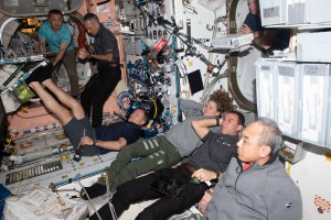 Members of the Axiom Mission 3 (Ax-3) and Expedition 70 crews join each other for movie night inside the International Space Station's Harmony module. From left are, Ax-3 Mission Specialist Alper Gezeravcı; Ax-3 Pilot Walter Villadei; Ax-3 Commander Michael López-Alegría; Expedition 70 Flight Engineer Loral O'Hara from NASA; Ax-3 Mission Specialist Marcus Wandt; and Expedition 70 Flight Engineer Satoshi Furukawa from JAXA (Japan Aerospace Exploration Agency); partially obscured at top right is, Expedition 70 Commander Andreas Mogensen from ESA (European Space Agency).