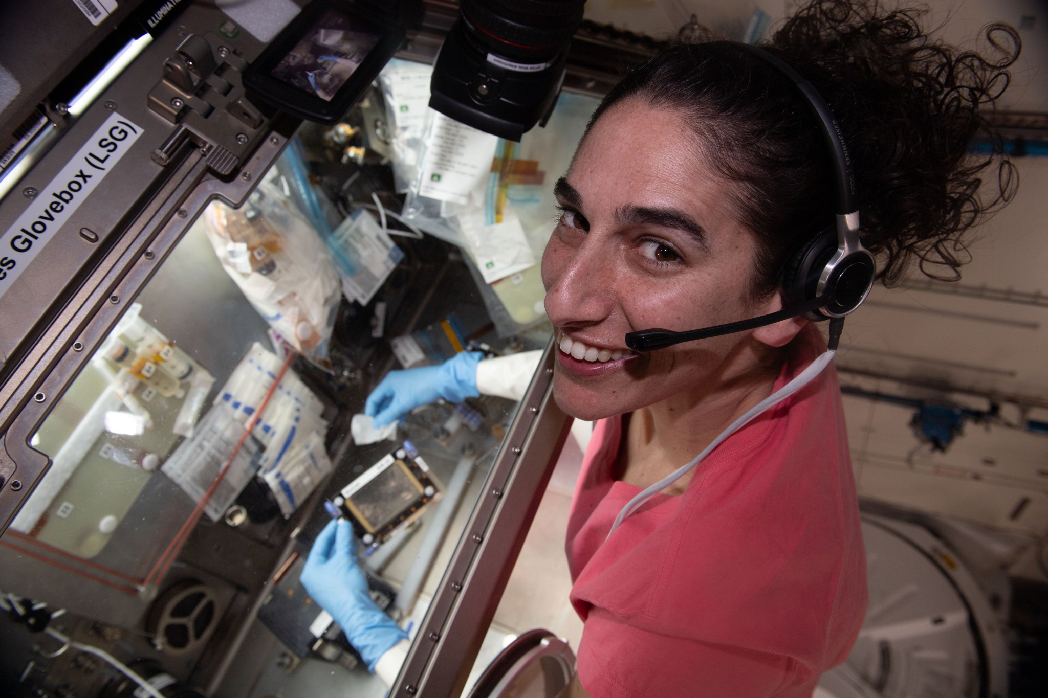 NASA astronaut and Expedition 70 Flght Engineer Jasmin Moghbeli works inside the Life Science Glovebox for the Microgravity Associated Bone Loss-A investigation. She was processing bone cell samples obtained from human donors on Earth and exploring space-caused bone loss. Results may help doctors learn how to protect and treat astronauts on long-term missions and inform treatments for bone conditions on Earth.