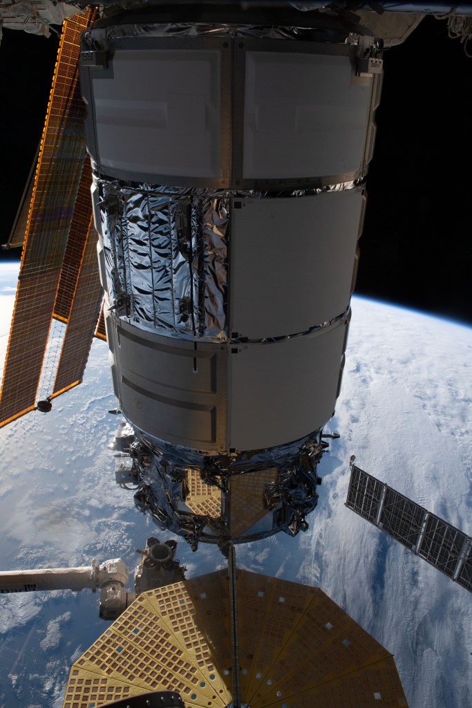 Northrop Grumman's Cygnus resupply ship is pictured attached to the International Space Station shortly after the Canadarm2 robotic arm grappled and installed it to the Unity module's Earth-facing port.