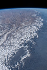 The Kashmir Valley (bottom) and the Himalayas are pictured from the International Space Station as it orbited 261 miles above the Afghanistan-Pakistan border.