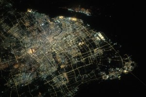 The city lights of Shanghai, the most populous city in China with a population of about 24.9 million, and the Huangpu River flowing through downtown, are pictured from the International Space Station as it orbited 260 miles above the East China Sea.