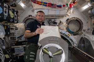 ESA (European Space Agency) astronaut and Expedition 70 Commander Andreas Mogensen removes the multipurpose experiment platform (MPEP) from the Kibo laboratory module's airlock. External science payloads are attached to the MPEP which is then placed inside Kibo's airlock. Next, the airlock is depressurized before the Japanese robotic arm grapples the MPEP and places it on Kibo's Exposed Facility where external science experiments are deployed.