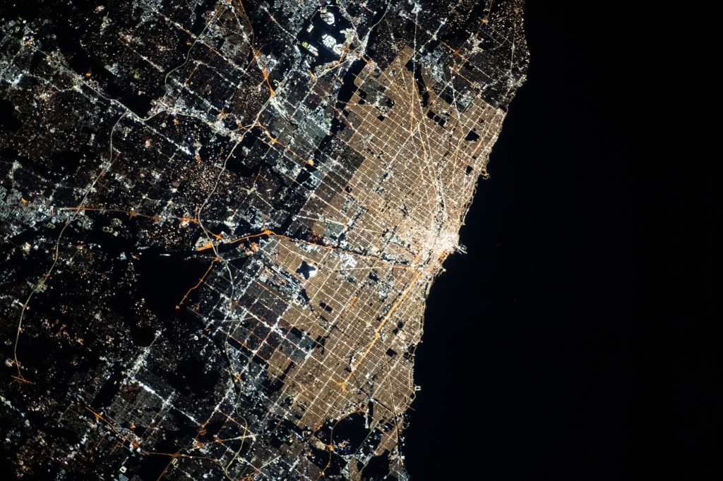Chicago, Illinois, was pictured at night by Expedition 70 Flight Engineer Jasmin Moghbeli as the International Space Station orbited 261 miles above Lake Michigan.