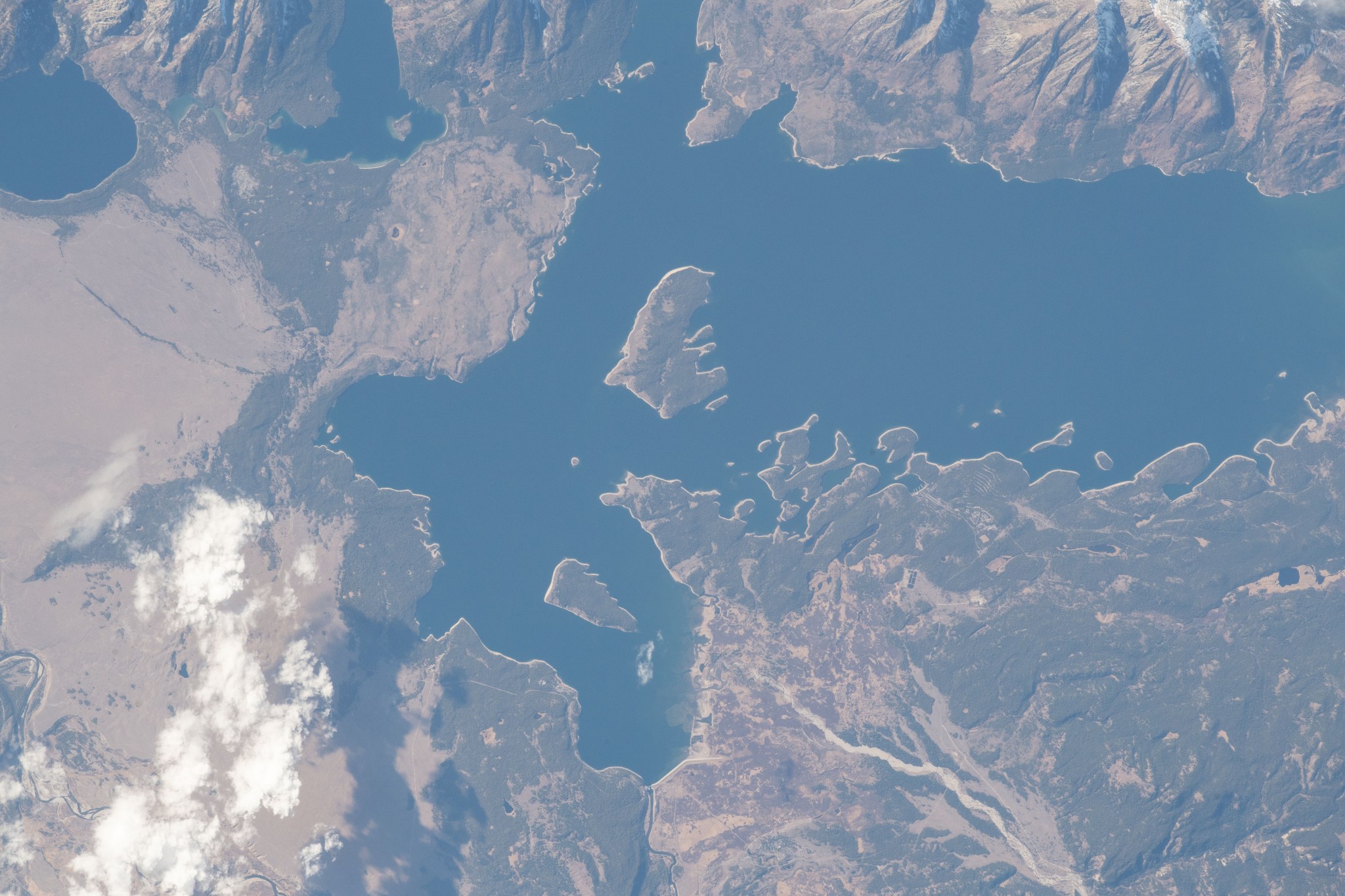 Jackson Lake, in the state of Wyoming's Grand Teton National Park, is a natural remnant of glacial gouging and was enlarged by the construction of the Jackson Lake Dam in the early 20th century. The International Space Station was orbiting nearly 256 miles above North America when this photograph was taken by an Expedition 57 crew member.