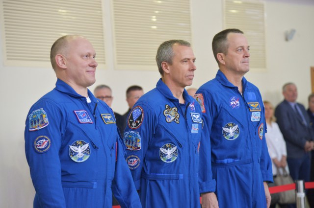 At the Gagarin Cosmonaut Training Center in Star City, Russia, Expedition 55 prime crew members Oleg Artemyev of Roscosmos (left) and Drew Feustel and Ricky Arnold of NASA (center and right) report for a day of qualification exams Feb. 20. They will launch March 21 on the Soyuz MS-08 spacecraft from the Baikonur Cosmodrome in Kazakhstan for a five month mission on the International Space Station.