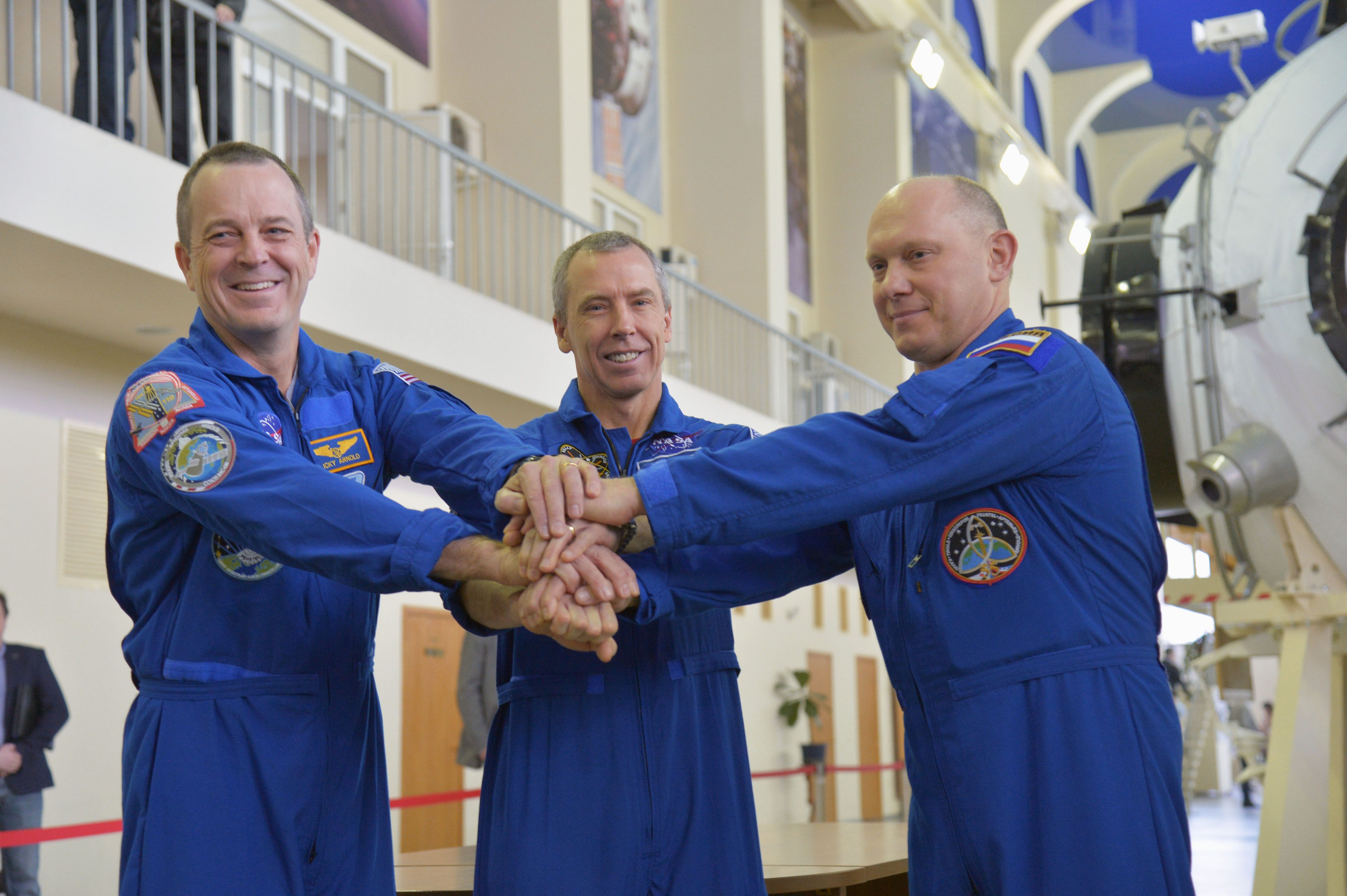 At the Gagarin Cosmonaut Training Center in Star City, Russia, Expedition 55 prime crew members Ricky Arnold and Drew Feustel of NASA (left and center) and Oleg Artemyev of Roscosmos (right) pose for pictures during a day of qualification exams Feb. 20. They will launch March 21 on the Soyuz MS-08 spacecraft from the Baikonur Cosmodrome in Kazakhstan for a five month mission on the International Space Station.