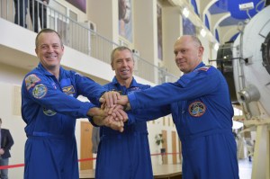 At the Gagarin Cosmonaut Training Center in Star City, Russia, Expedition 55 prime crew members Ricky Arnold and Drew Feustel of NASA (left and center) and Oleg Artemyev of Roscosmos (right) pose for pictures during a day of qualification exams Feb. 20. They will launch March 21 on the Soyuz MS-08 spacecraft from the Baikonur Cosmodrome in Kazakhstan for a five month mission on the International Space Station.