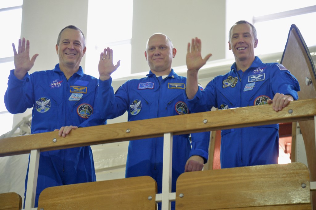 At the Gagarin Cosmonaut Training Center in Star City, Russia, Expedition 55 prime crew members Ricky Arnold and Drew Feustel of NASA (left and center) and Oleg Artemyev of Roscosmos (right) pose for pictures during a day of qualification exams Feb. 20. They will launch March 21 on the Soyuz MS-08 spacecraft from the Baikonur Cosmodrome in Kazakhstan for a five month mission on the International Space Station.
