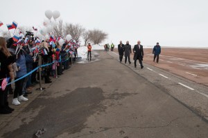 Expedition 55 crewmembers Ricky Arnold of NASA, Oleg Artemyev of Roscosmos and Drew Feustel of NASA are greeted by local school children in Baikonur, Kazakhstan after their arrival March 4 following a flight from their training base outside of Moscow. The trio will launch March 21 on the Soyuz MS-08 spacecraft for a five month mission on the International Space Station.
