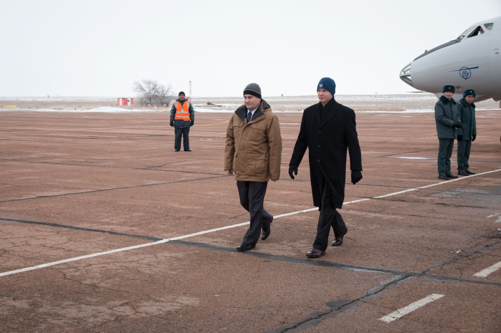 Expedition 55 backup crew members Alexey Ovchinin of Roscosmos (left) and Nick Hague of NASA (right) arrive at the airstrip in Baikonur, Kazakhstan March 4 following a flight from their training base outside of Moscow. They are serving as backups to Ricky Arnold and Drew Feustel of NASA and Oleg Artemyev of Roscosmos, who will launch March 21 on the Soyuz MS-08 spacecraft for a five month mission on the International Space Station.