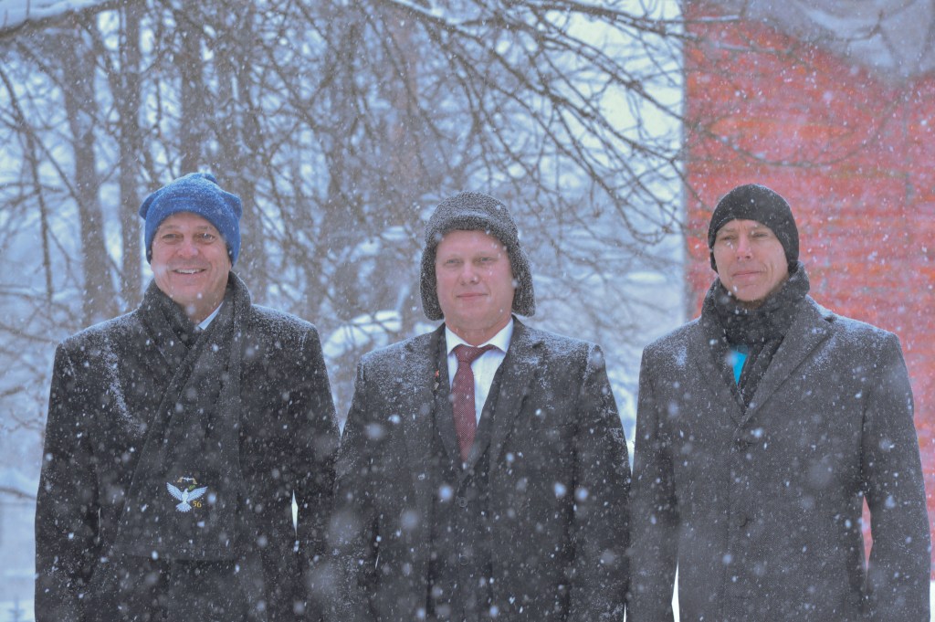 Bundled up against a blizzard, Expedition 55 crewmembers Ricky Arnold of NASA (left), Oleg Artemyev of Roscosmos (center) and Drew Feustel of NASA (right) pose for pictures March 4 at the Gagarin Cosmonaut Training Center in Star City, Russia before flying to their launch site at the Baikonur Cosmodrome in Kazakhstan. The trio will launch March 21 on the Soyuz MS-08 spacecraft for a five month mission on the International Space Station.