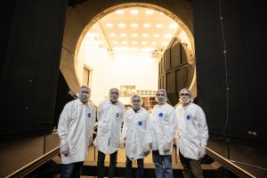 The Houston We Have a Podcast team is pictured with Jonathan Homan and Steven Del Papa inside Thermal Vacuum Chamber A. Credits: NASA/Robert Markowitz