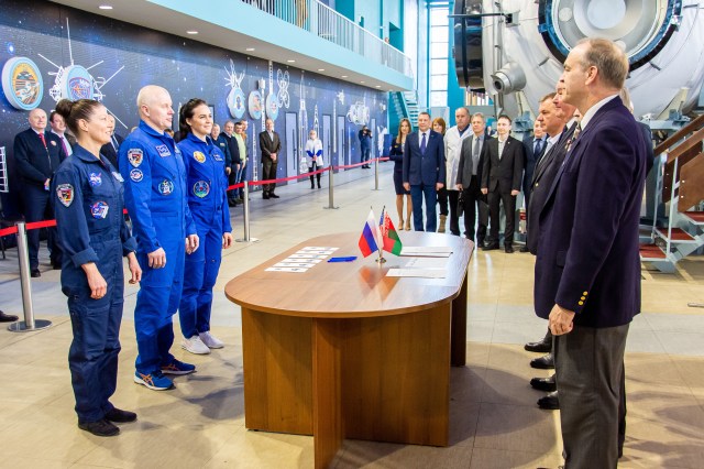 Soyuz MS-25 crew members (from left) Tracy Dyson from NASA, Oleg Novitskiy from Roscosmos, and Belarus spaceflight participant Marina Vasilevskaya meet with mission managers before beginning crew qualification exams at the Gagarin Cosmonaut Training Center in Star City, Russia.