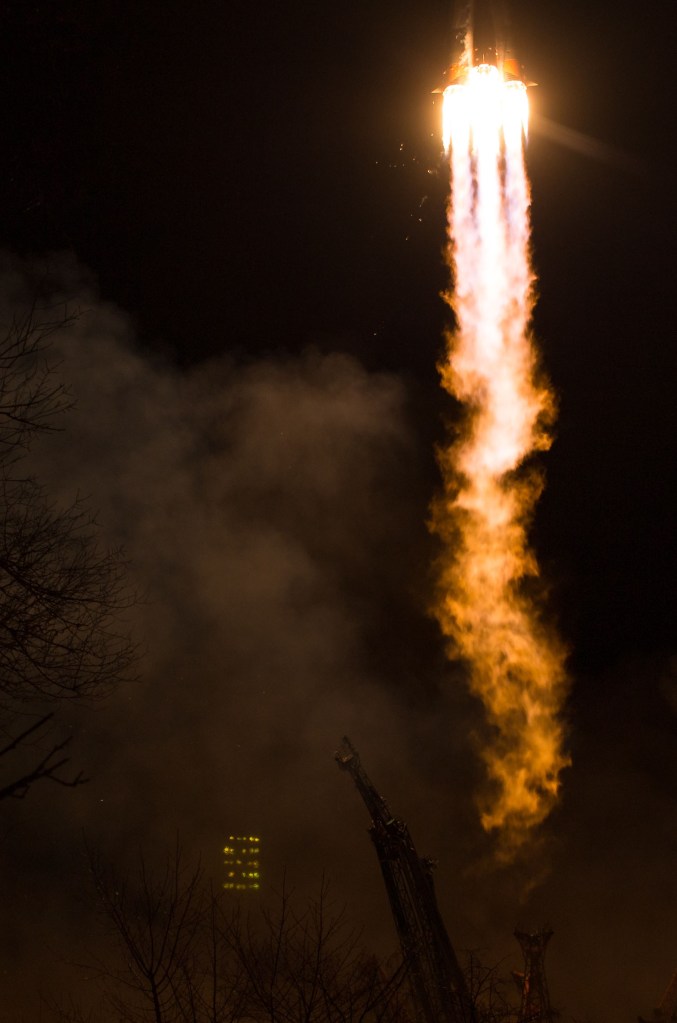 The Soyuz MS-08 rocket is launched with Expedition 55 Soyuz Commander Oleg Artemyev of Roscosmos and flight engineers Ricky Arnold and Drew Feustel of NASA, Wednesday, March 21, 2018 at the Baikonur Cosmodrome in Kazakhstan. Artemyev, Arnold, and Feustel will spend the next five months living and working aboard the International Space Station.