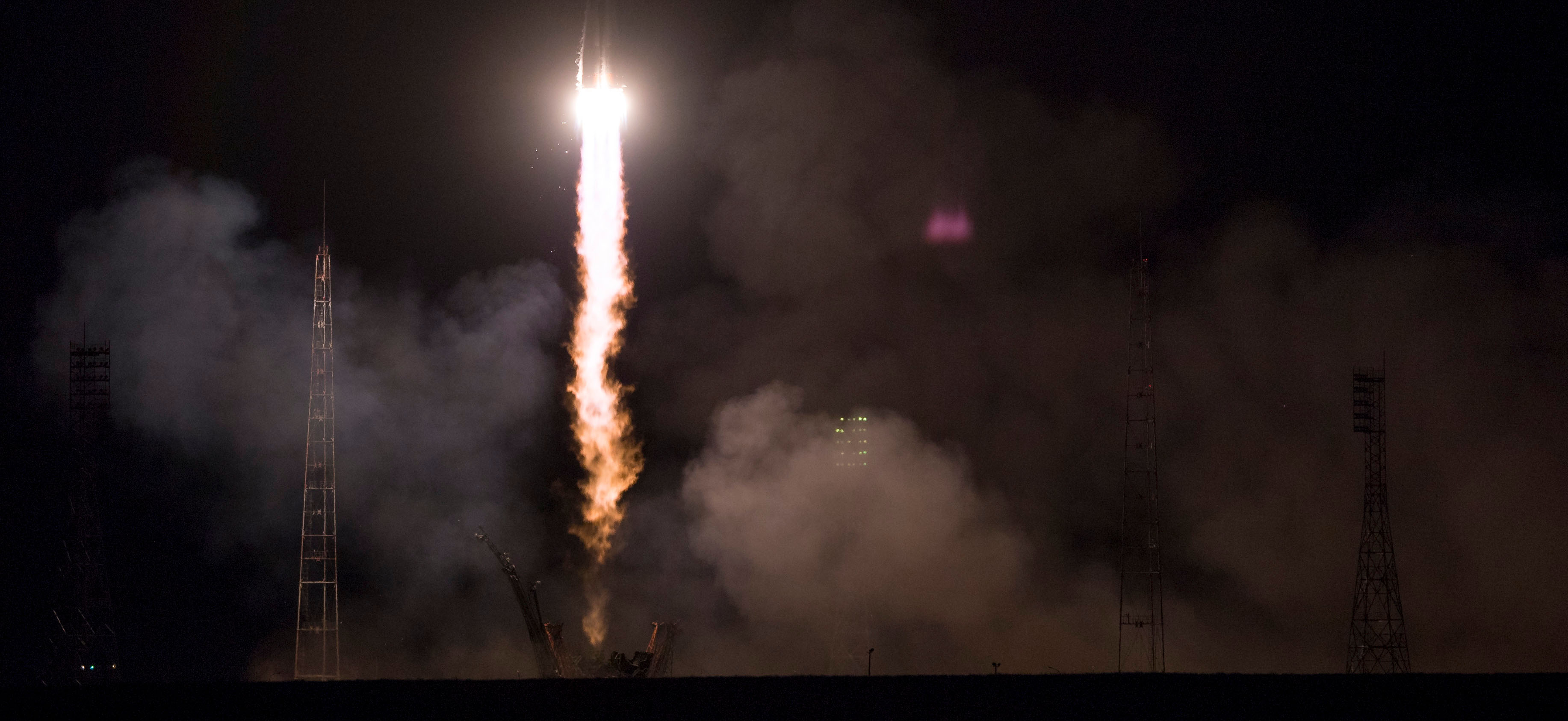 The Soyuz MS-08 rocket is launched with Expedition 55 Soyuz Commander Oleg Artemyev of Roscosmos and flight engineers Ricky Arnold and Drew Feustel of NASA, Wednesday, March 21, 2018 at the Baikonur Cosmodrome in Kazakhstan. Artemyev, Arnold, and Feustel will spend the next five months living and working aboard the International Space Station.