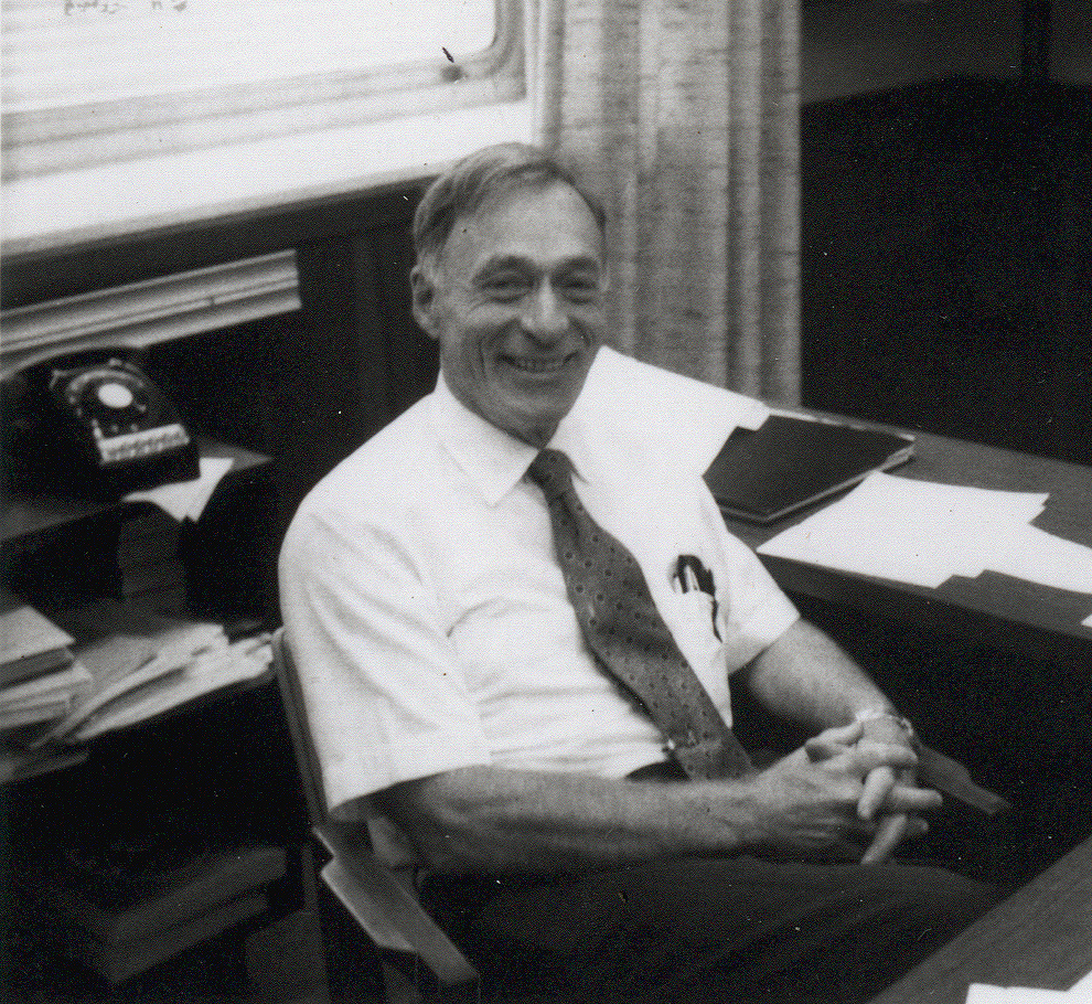 Man at desk in office.