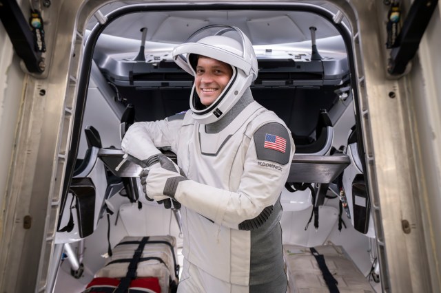jsc2024e011719 (Dec. 3, 2023) --- NASA astronaut and SpaceX Crew-8 Commander Matthew Dominick is pictured in his pressure suit during a crew equipment integration test at SpaceX headquarters in Hawthorne, California.