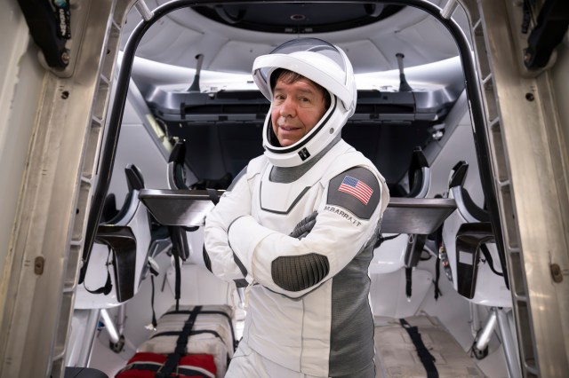 NASA astronaut and SpaceX Crew-8 Pilot Michael Barratt is pictured in his pressure suit during a crew equipment integration test at SpaceX headquarters in Hawthorne, California.