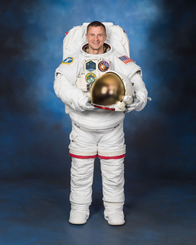 jsc2018e026642_alt (April 30, 2019) --- NASA astronaut Andrew Morgan poses in a U.S. spacesuit, also known as an Extravehicular Mobility Unit (EMU).