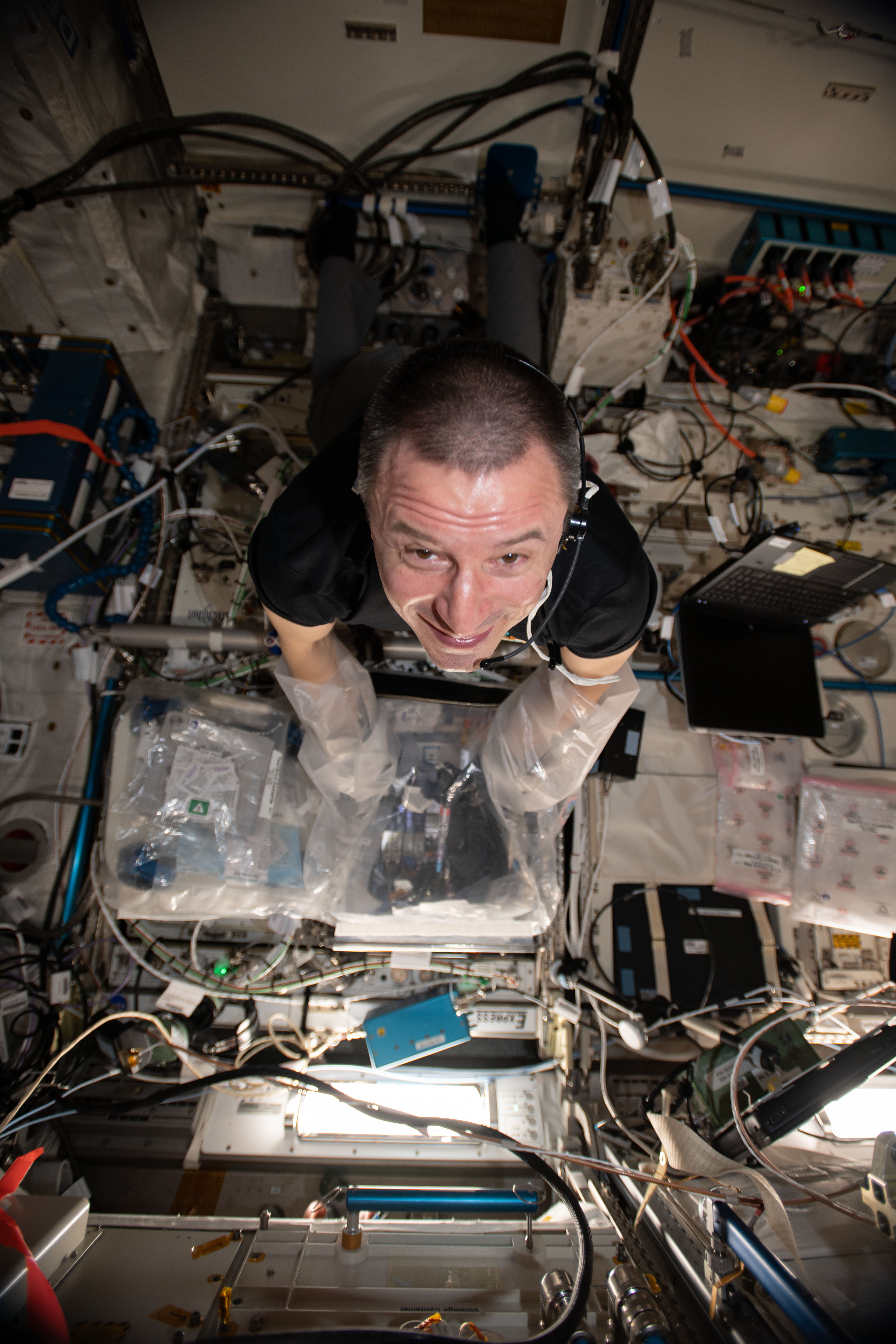 iss062e115402 (March 26, 2020) --- NASA astronaut and Expedition 62 Flight Engineer Andrew Morgan services the Bio-Fabrication Facility (BFF), a 3D bioprinter that seeks to demonstrate manufacturing human organs in space to help patients on Earth. The BFF may even lead to future crews printing their own food and medicines on missions farther away from Earth.