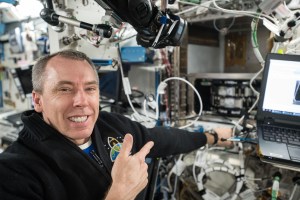 NASA astronaut Drew Feustel conducts science operations using the Multi-Use Variable-G Platform that enables research into smaller and microscopic organisms.