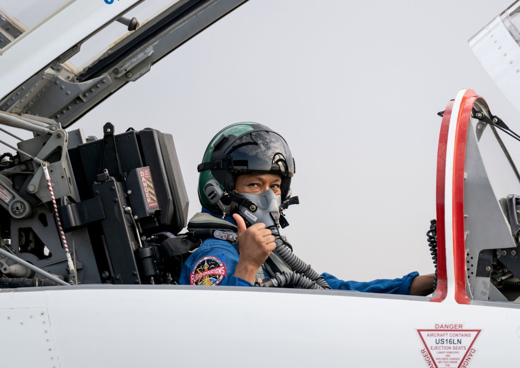 NASA astronaut and SpaceX Crew-8 Mission Specialist Jeanette Epps is seated inside a T-38 trainer jet at Ellington Field in Houston, Texas.