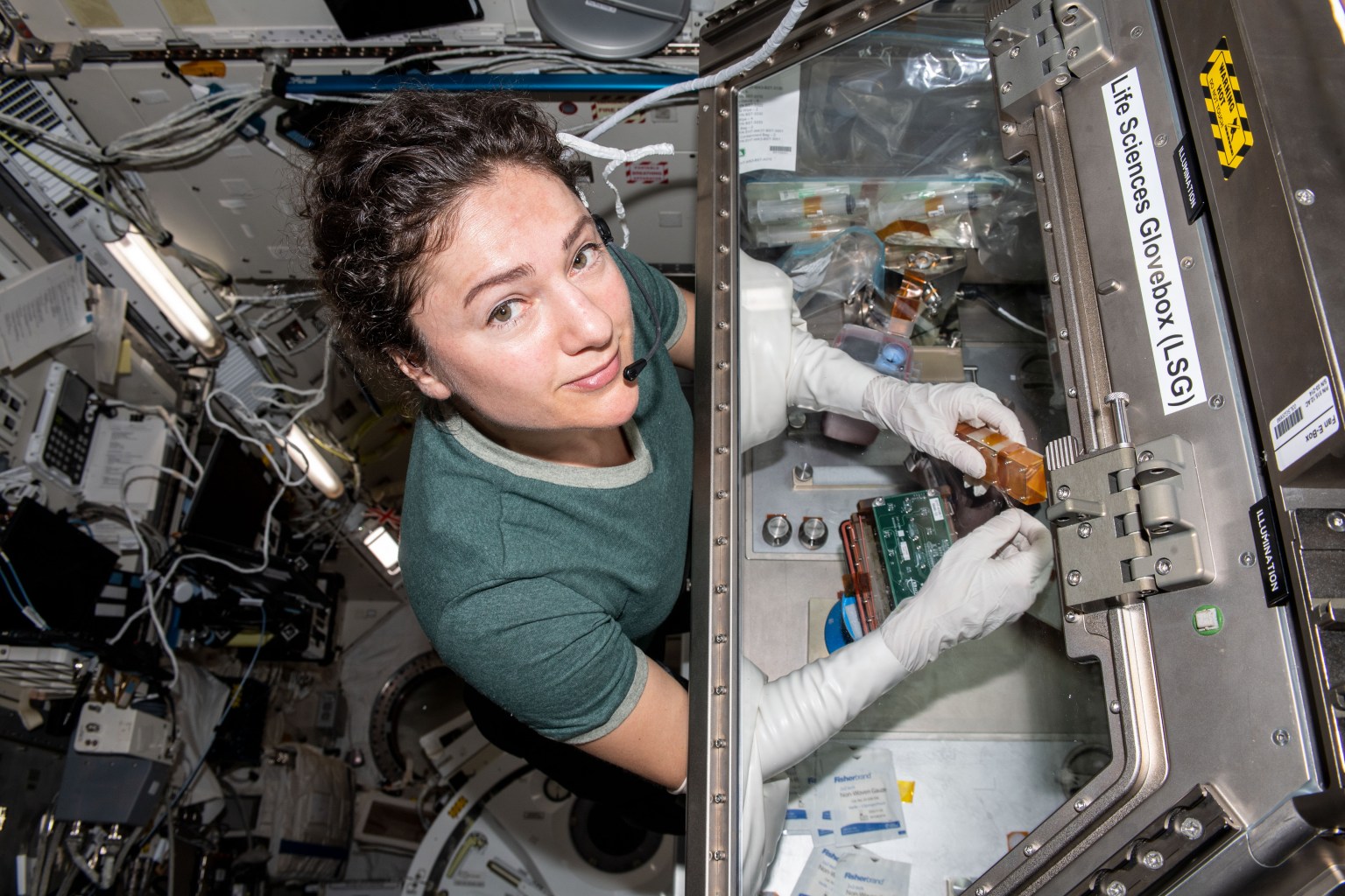 iss062e120658 (April 2, 2020) --- NASA astronaut and Expedition 62 Flight Engineer conducts cardiac research in the Life Sciences Glovebox located in the Japanese Kibo laboratory module. The Engineered Heart Tissues investigation could promote a better understanding of cardiac function in microgravity which would be useful for drug development and other applications related to heart conditions on Earth.