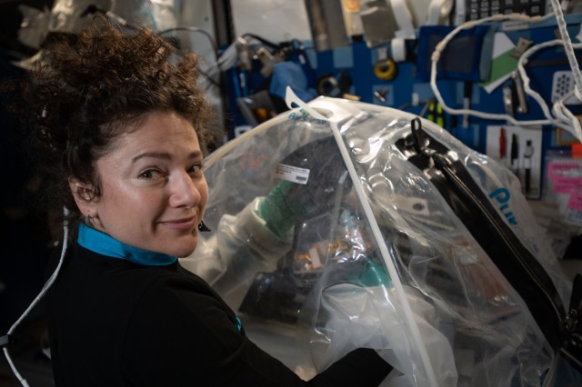 iss062e092351 (March 13, 2020) --- NASA astronaut and Expedition 62 Flight Engineer Jessica Meir sets up the Multi-use Variable-g Platform-02 inside the portable glovebag to support cardiac research aboard the International Space Station. She was installing hardware for the Cell-03 investigation that induces stem cells to generate heart precursor cells and cultures those cells on the space station to analyze and compare with cultures grown on Earth. Results may help treat spaceflight-induced cardiac abnormalities and contribute to accelerated development and reduced cost of drug therapies on Earth.