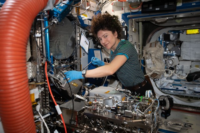 iss062e014322 (Feb. 15, 2020) --- Expedition 62 Flight Engineer and NASA astronaut Jessica Meir works on orbital plumbing tasks inside the Tranquility module's Life Support Rack.