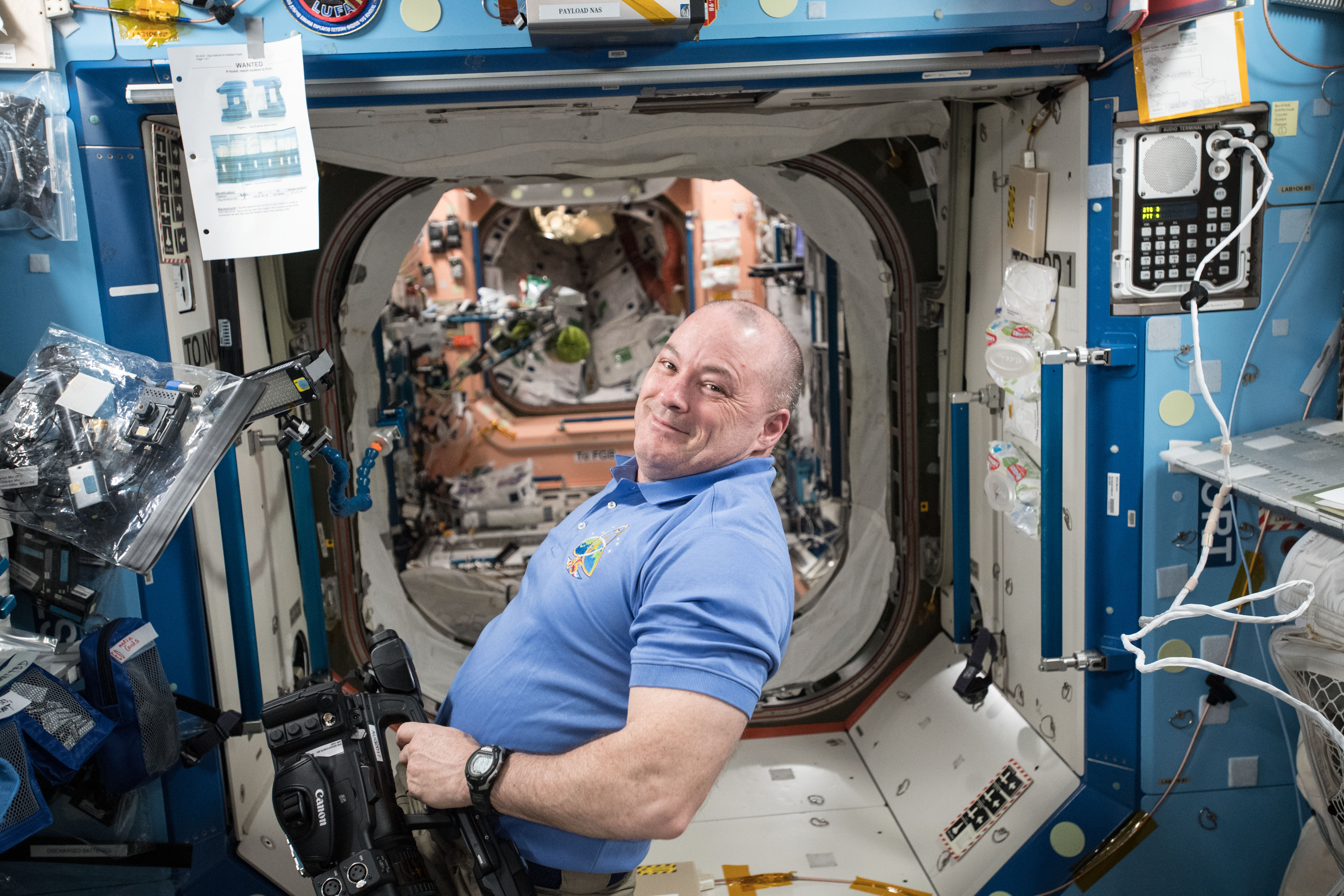 NASA astronaut Scott Tingle prepares video equipment for a series of education videos being recorded for the STEMonstration campaign which demonstrates scientific concepts in space for students and teachers.