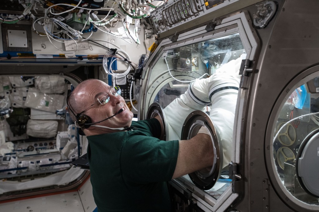 NASA astronaut Scott Tingle performs research operations with the Microgravity Sciences Glovebox inside the U.S. Destiny laboratory module. Tingle was working on the Metabolic Tracking experiment that looks at a particular type of medicine and how it interacts with human tissue cultures. Results could improve therapies in space and lead to better, cheaper drugs on Earth.