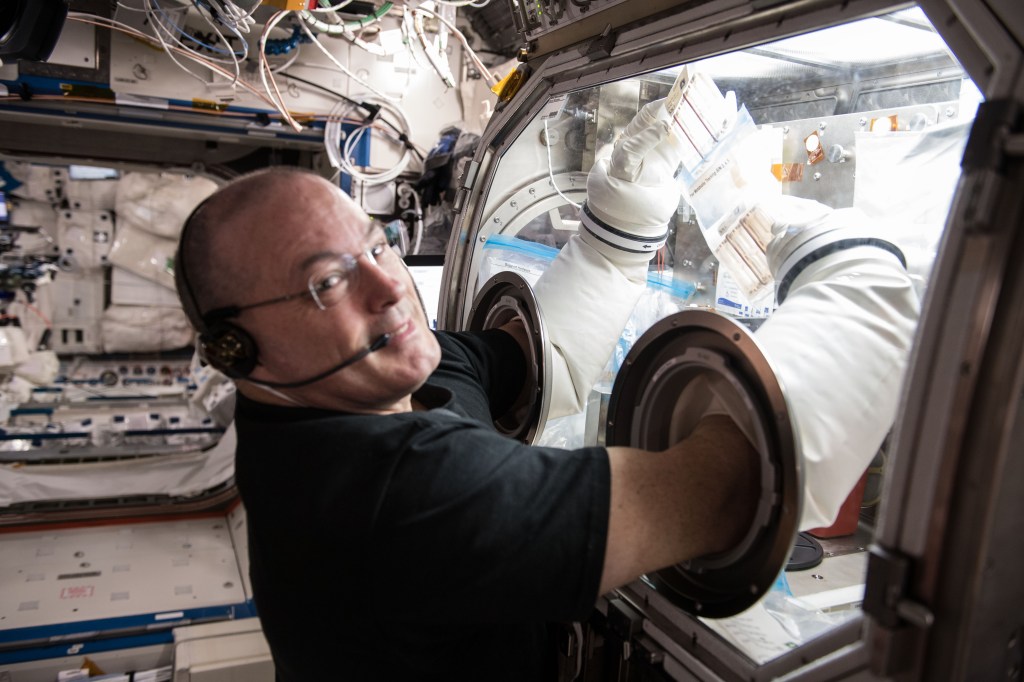 NASA astronaut Scott Tingle performs research operations with the Microgravity Sciences Glovebox inside the U.S. Destiny laboratory module. Tingle was working on the Metabolic Tracking experiment that looks at a particular type of medicine and how it interacts with human tissue cultures. Results could improve therapies in space and lead to better, cheaper drugs on Earth.