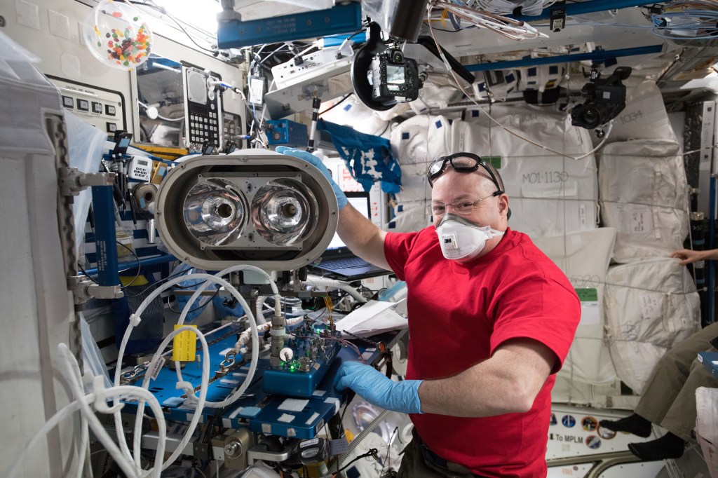 NASA astronaut Scott Tingle replaces a failed light bulb in a light to be used on a new external television camera group (ETVCG) that will be installed on an upcoming spacewalk. Parts from the old ETVCG, removed during a previous spacewalk, will be shipped back to Earth in the SpaceX Dragon resupply ship for refurbishment.