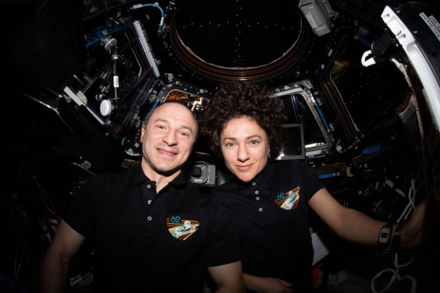 iss062e024073 (Feb. 18, 2020) --- NASA astronauts Andrew Morgan and Jessica Meir pose for a portrait inside the cupola, the International Space Station's "window to the world." The two Expedition 62 Flight Engineers were participating in the capture activities of Northrop Grumman's Cygnus cargo craft.
