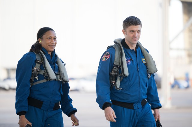 NASA astronauts Jeanette Epps and Matthew Dominick, SpaceX Crew-8 Mission Specialist and Commander respectively, walk together before a T-38 trainer jet flight at Ellington Field in Houston, Texas.