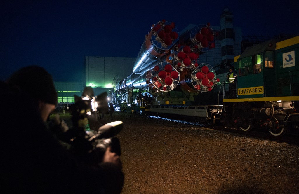 The Soyuz rocket is rolled out by train to the launch pad, Monday, March 19, 2018 at the Baikonur Cosmodrome in Kazakhstan. Expedition 55 crewmembers Ricky Arnold and Drew Feustel of NASA and Oleg Artemyev of Roscosmos are scheduled to launch at 1:44 p.m. Eastern time (11:44 p.m. Baikonur time) on March 21 and will spend the next five months living and working aboard the International Space Station.