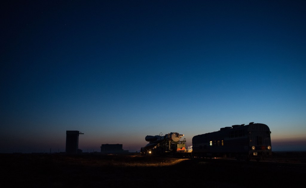 The Soyuz rocket is rolled out by train to the launch pad, Monday, March 19, 2018 at the Baikonur Cosmodrome in Kazakhstan. Expedition 55 crewmembers Ricky Arnold and Drew Feustel of NASA and Oleg Artemyev of Roscosmos are scheduled to launch at 1:44 p.m. Eastern time (11:44 p.m. Baikonur time) on March 21 and will spend the next five months living and working aboard the International Space Station.
