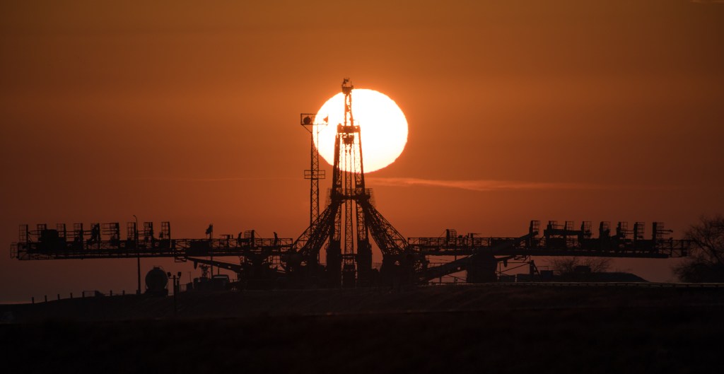 The Sun is seen rising behind the launch pad, Monday, March 19, 2018 at the Baikonur Cosmodrome in Kazakhstan. Expedition 55 crewmembers Ricky Arnold and Drew Feustel of NASA and Oleg Artemyev of Roscosmos are scheduled to launch at 1:44 p.m. Eastern time (11:44 p.m. Baikonur time) on March 21 and will spend the next five months living and working aboard the International Space Station.
