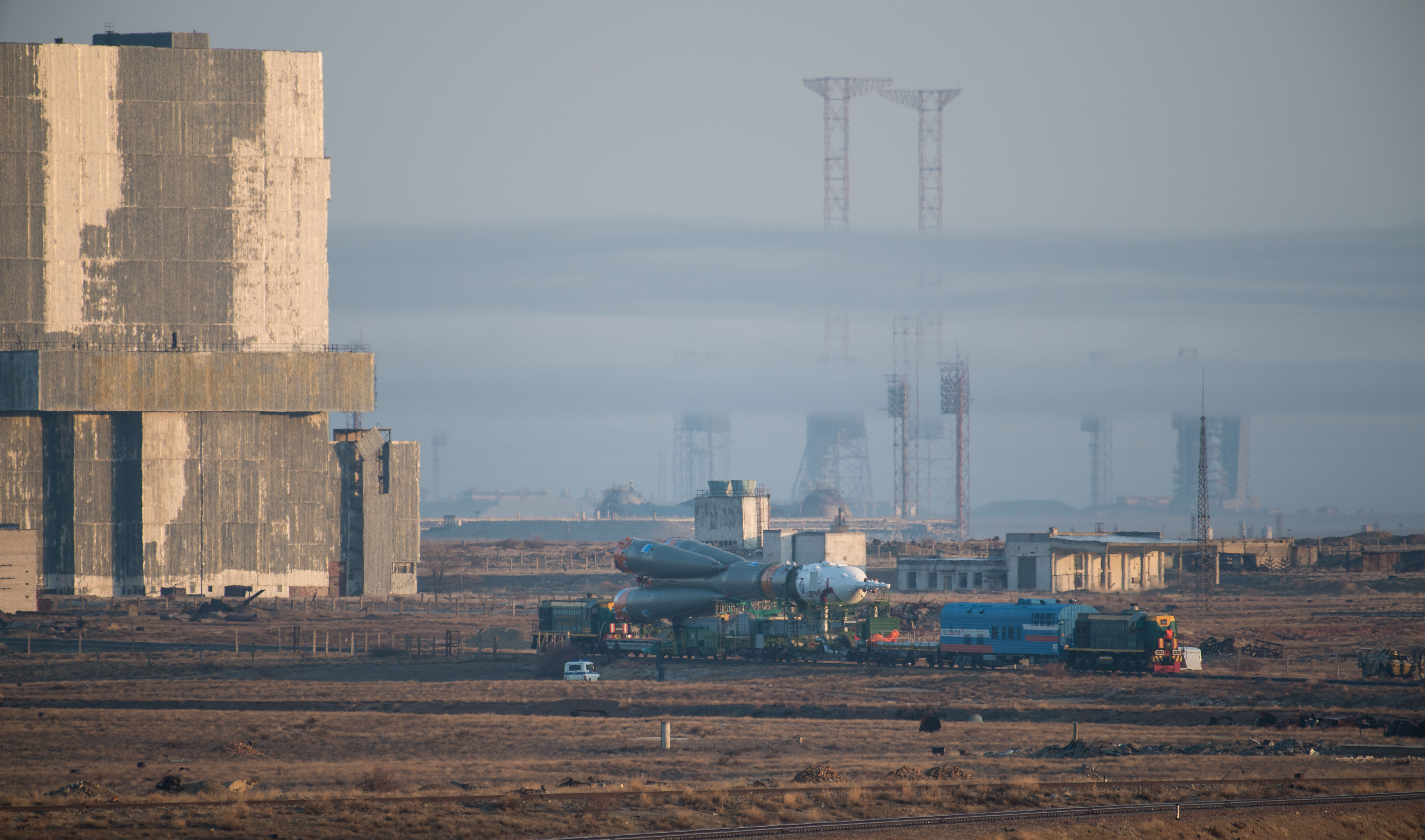 The Soyuz rocket is rolled out by train to the launch pad, Monday, March 19, 2018 at the Baikonur Cosmodrome in Kazakhstan. Expedition 55 crewmembers Ricky Arnold and Drew Feustel of NASA and Oleg Artemyev of Roscosmos are scheduled to launch at 1:44 p.m. Eastern time (11:44 p.m. Baikonur time) on March 21 and will spend the next five months living and working aboard the International Space Station.
