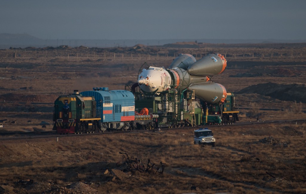 The Soyuz rocket is rolled out by train to the launch pad, Monday, March 19, 2018 at the Baikonur Cosmodrome in Kazakhstan. Expedition 55 crewmembers Ricky Arnold and Drew Feustel of NASA and Oleg Artemyev of Roscosmos are scheduled to launch at 1:44 p.m. Eastern time (11:44 p.m. Baikonur time) on March 21 and will spend the next five months living and working aboard the International Space Station.