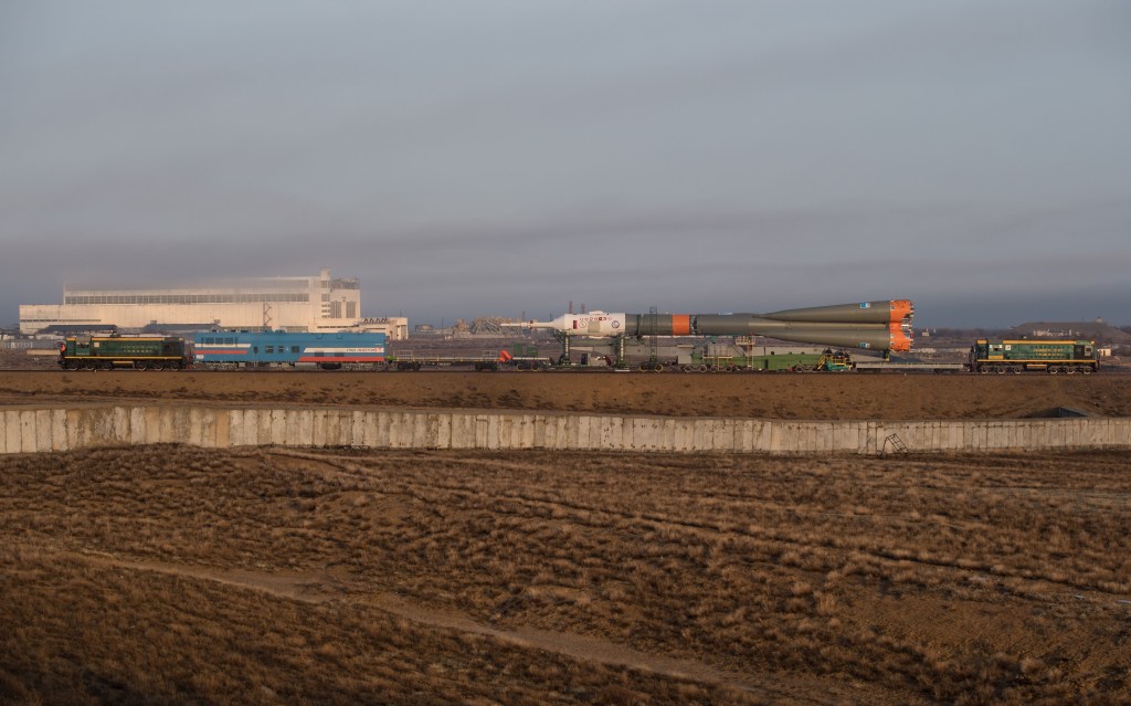 The Soyuz rocket is rolled out by train to the launch pad, Monday, March 19, 2018 at the Baikonur Cosmodrome in Kazakhstan. Expedition 55 crewmembers Ricky Arnold and Drew Feustel of NASA and Oleg Artemyev of Roscosmos are scheduled to launch at 1:44 p.m. Eastern time (11:44 p.m. Baikonur time) on March 21 and will spend the next five months living and working aboard the International Space Station.