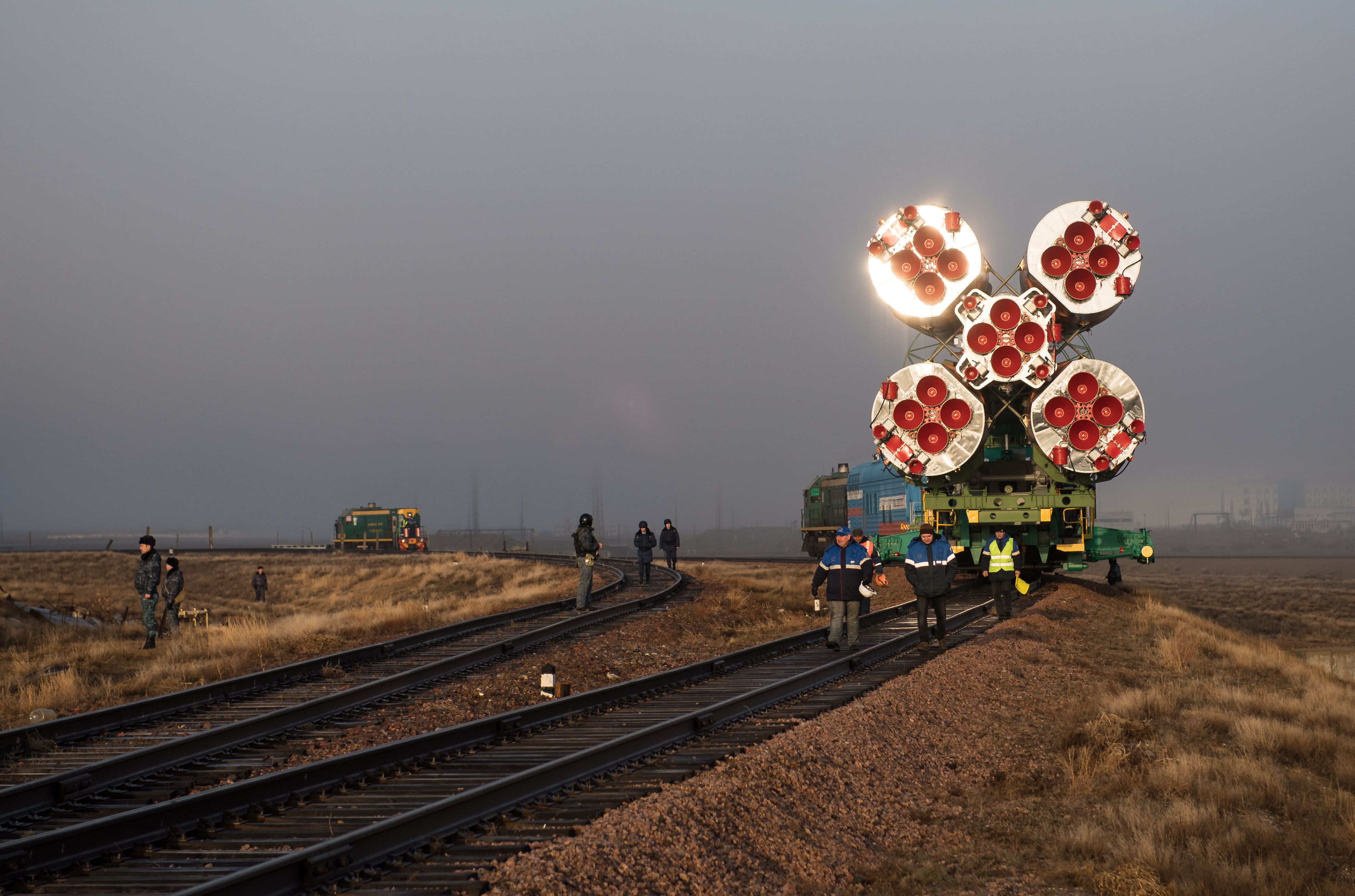 The Soyuz rocket is rolled out by train to the launch pad, Monday, March 19, 2018 at the Baikonur Cosmodrome in Kazakhstan. Expedition 55 crewmembers Ricky Arnold and Drew Feustel of NASA and Oleg Artemyev of Roscosmos are scheduled to launch at 1:44 p.m. Eastern time (11:44 p.m. Baikonur time) on March 21 and will spend the next five months living and working aboard the International Space Station.