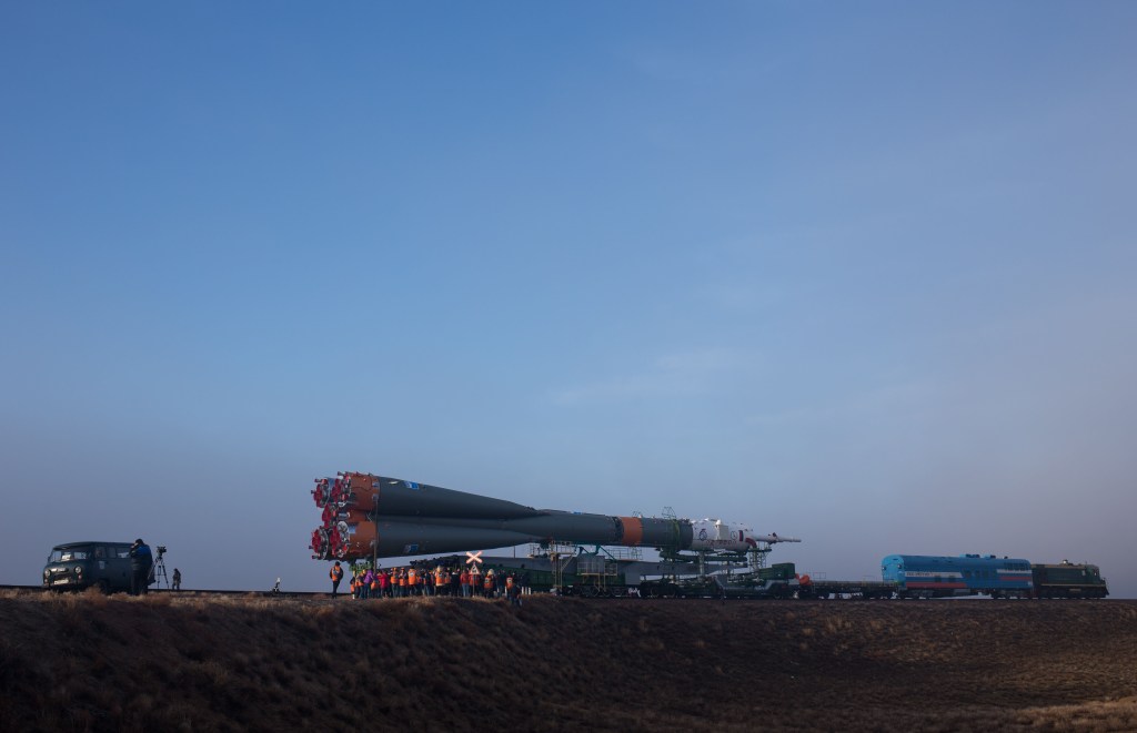 The Soyuz rocket is rolled out by train to the launch pad, Monday, March 19, 2018 at the Baikonur Cosmodrome in Kazakhstan. Expedition 55 crewmembers Ricky Arnold and Drew Feustel of NASA and Oleg Artemyev of Roscosmos are scheduled to launch at 1:44 p.m. Eastern time (11:44 p.m. Baikonur time) on March 21 and will spend the next five months living and working aboard the International Space Station.
