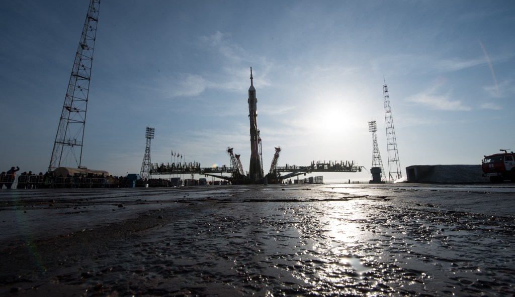 The Soyuz rocket is raised into a vertical position on the launch pad, Monday, March 19, 2018 at the Baikonur Cosmodrome in Kazakhstan. Expedition 55 crewmembers Ricky Arnold and Drew Feustel of NASA and Oleg Artemyev of Roscosmos are scheduled to launch at 1:44 p.m. Eastern time (11:44 p.m. Baikonur time) on March 21 and will spend the next five months living and working aboard the International Space Station.