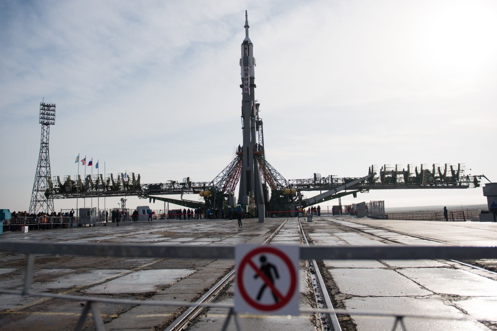 The Soyuz rocket is raised into a vertical position on the launch pad, Monday, March 19, 2018 at the Baikonur Cosmodrome in Kazakhstan. Expedition 55 crewmembers Ricky Arnold and Drew Feustel of NASA and Oleg Artemyev of Roscosmos are scheduled to launch at 1:44 p.m. Eastern time (11:44 p.m. Baikonur time) on March 21 and will spend the next five months living and working aboard the International Space Station.