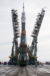 The Soyuz rocket is seen on the launch pad as the service structure arms are closed around it, Monday, March 19, 2018 at the Baikonur Cosmodrome in Kazakhstan. Expedition 55 crewmembers Ricky Arnold and Drew Feustel of NASA and Oleg Artemyev of Roscosmos are scheduled to launch at 1:44 p.m. Eastern time (11:44 p.m. Baikonur time) on March 21 and will spend the next five months living and working aboard the International Space Station.