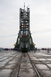 The Soyuz rocket is seen on the launch pad after the service structure arms were closed around it, Monday, March 19, 2018 at the Baikonur Cosmodrome in Kazakhstan. Expedition 55 crewmembers Ricky Arnold and Drew Feustel of NASA and Oleg Artemyev of Roscosmos are scheduled to launch at 1:44 p.m. Eastern time (11:44 p.m. Baikonur time) on March 21 and will spend the next five months living and working aboard the International Space Station.